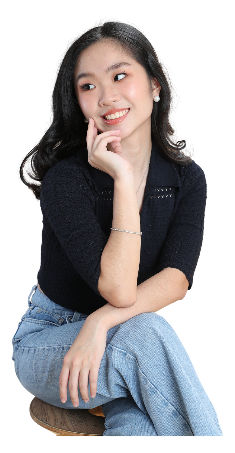 Portrait of Stephanie Lai seated and smiling