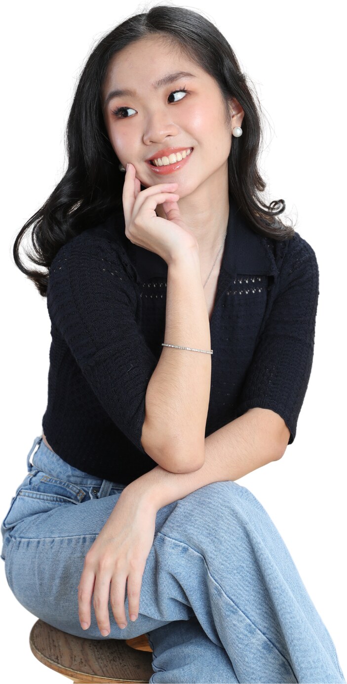 Stephanie Lai seated and smiling